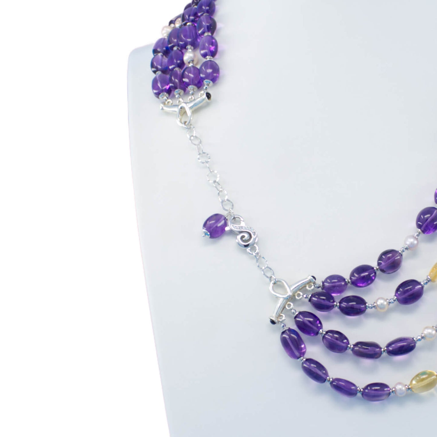 Collana arabesque in ametista e quarzo citrino.